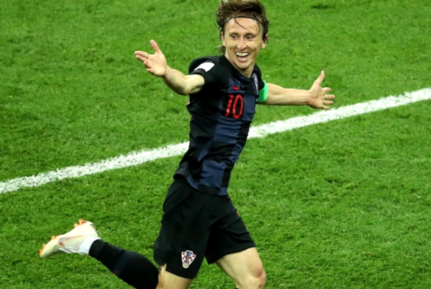 丹麦队逆转战胜对手靠近小组第一